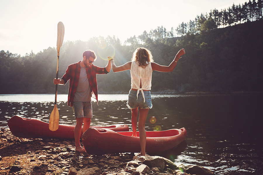 Couple going for a canoe ride in the lake